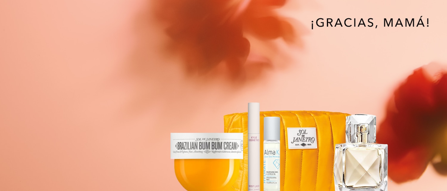 ¡GRACIAS, MAMÁ! Set de regalo con crema Brazilian Bum Bum, máscara de pestañas Kylie Cosmetics, aceite para cutículas Alma K y perfume, todo en un bolso amarillo brillante.