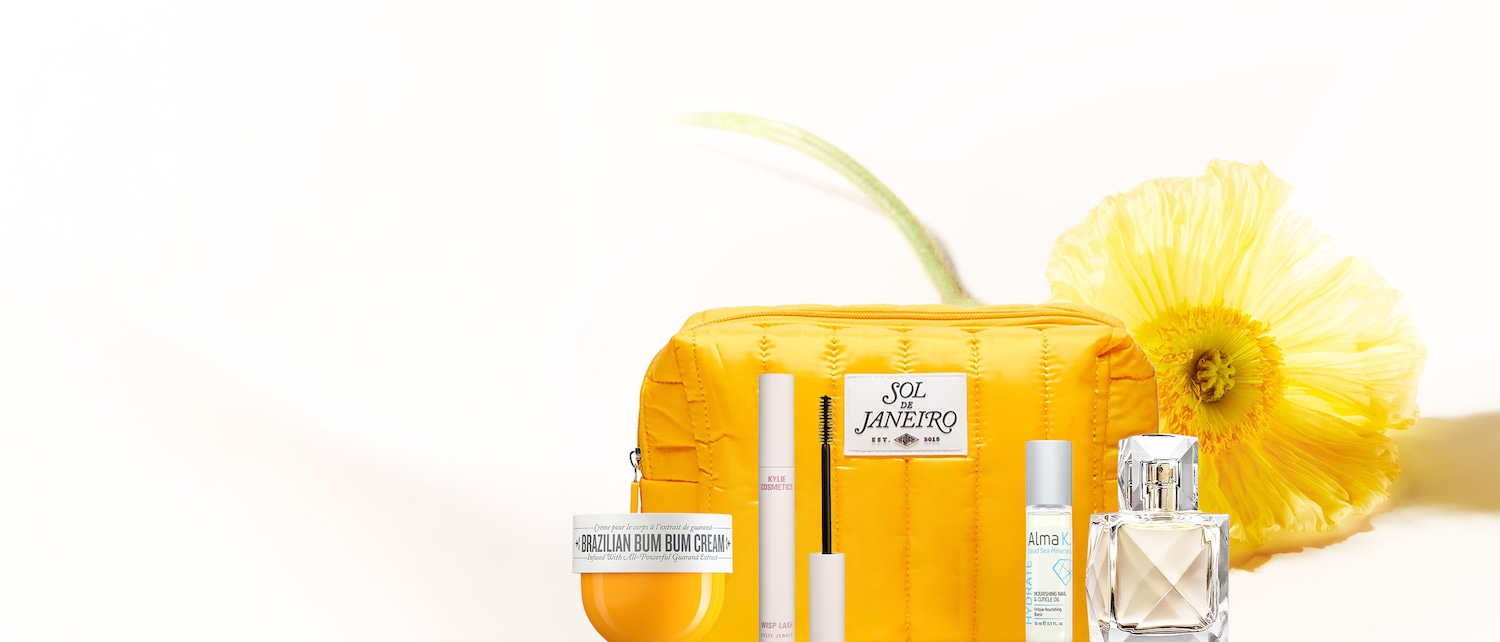 Discover a vibrant collection featuring Sol de Janeiro essentials, Kylie Cosmetics Wisp Lash mascara, Alma K nail oil, and Brazilian Bum Bum Cream, all in sunny yellow tones.